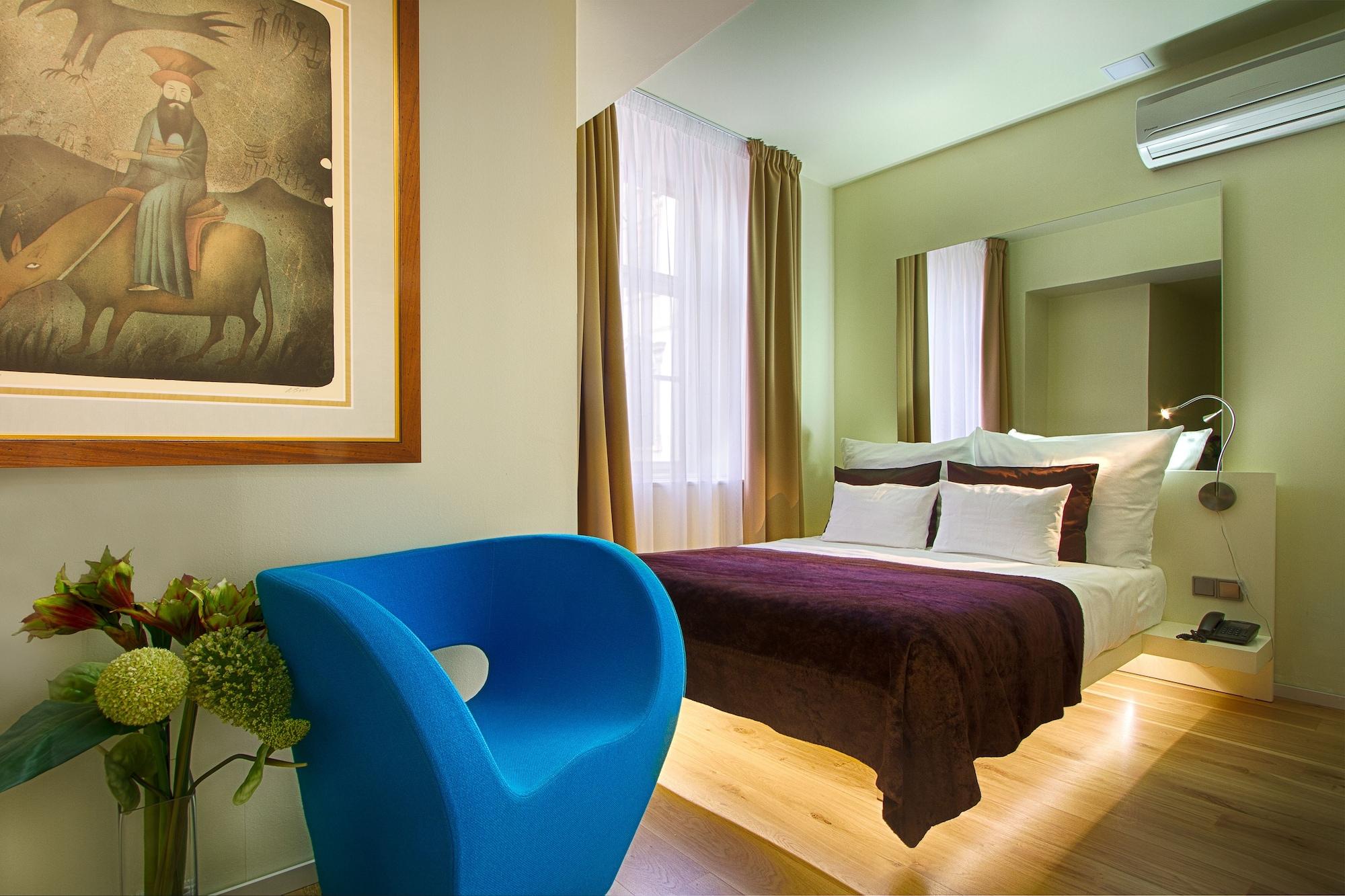 Three Storks Hotel Praha Bagian luar foto A room at the hotel